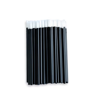 May include: A bundle of black applicator wands with white tips, arranged vertically against a white background. The wands are evenly spaced, creating a clean and organized appearance. The white tips provide a contrast to the black handles.
