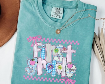 Comfort Colors® First Grade Teacher Shirt Back to School 1st Grade Tee Teacher Appreciation Gift Cute Elementary School Coquette Bow