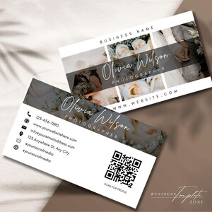 May include: White business card with a black and white photo of a couple on the top half. The bottom half has the text "Olivia Wilson Photographer" and contact information including a phone number, website, email address, and social media handles. A QR code is in the bottom right corner with the text "Scan for Profile".
