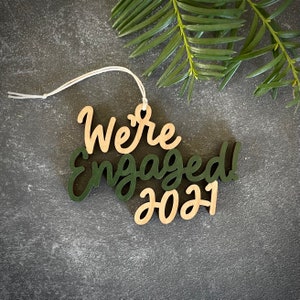 Choose your year and color We're Engaged Christmas Ornament Christmas Ornament Engagement Gift Christmas Gift Couple Gift image 1