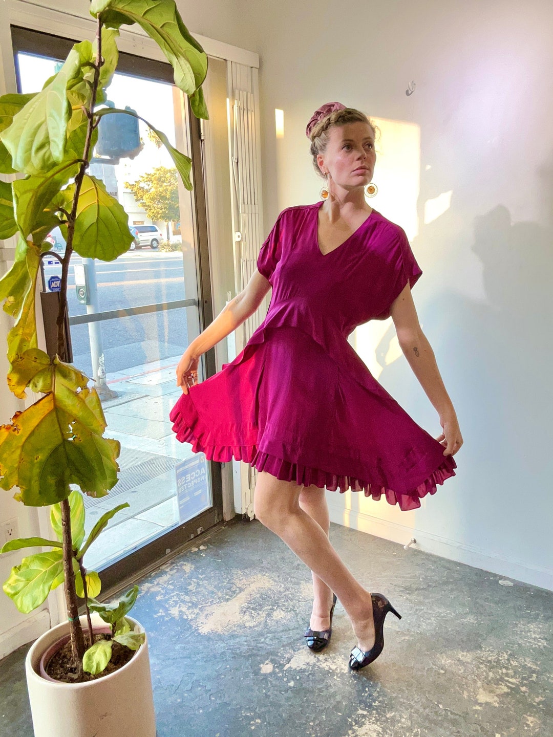Vestido con volantes de seda fucsia de Balenciaga México
