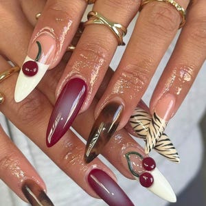 press on nails, fake nail, birthday nail, Gothic nail, Gold nail, elegant nail, unique nail, Stiletto nail, Long nail, freestyle nail, Virgin Mary Nail, Green nail, jewlery nail