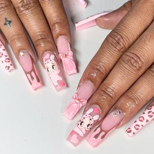 holiday nails, fake nail, gifts for her, press on nail, almond nail, valentines nails, silver accent nails, romantic nail art, elegant nails, daily wear nails, sparkly press-ons, red glitter nails, trendy nail, betty boop nails, pink nails, long square nails