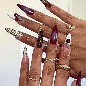 press on nails, fake nail, birthday nail, Gothic nail, Gold nail, elegant nail, unique nail, Stiletto nail, Long nail, freestyle nail, Virgin Mary Nail, Green nail, jewlery nail
