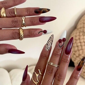 press on nails, fake nail, birthday nail, Gothic nail, Gold nail, elegant nail, unique nail, Stiletto nail, Long nail, freestyle nail, Virgin Mary Nail, Green nail, jewlery nail