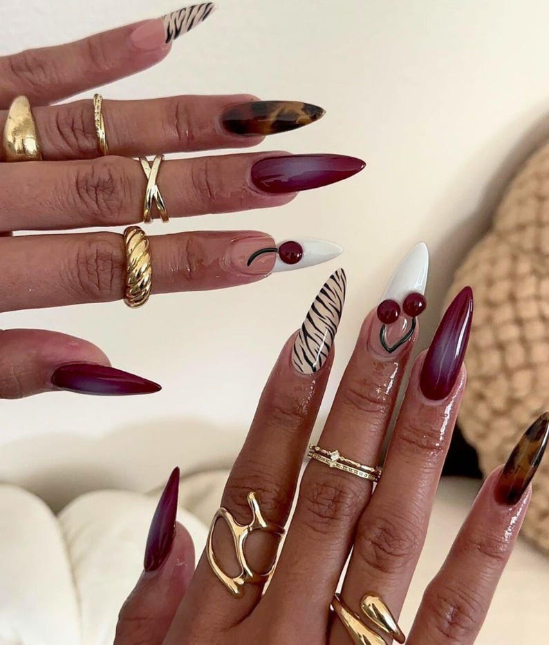 press on nails, fake nail, birthday nail, Gothic nail, Gold nail, elegant nail, unique nail, Stiletto nail, Long nail, freestyle nail, Virgin Mary Nail, Green nail, jewlery nail