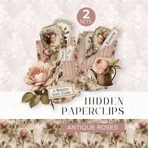 May include: Two sets of antique rose-themed hidden paperclips. The paperclips feature vintage-style tags with floral and portrait illustrations. The design includes a large rose and the text "A Memory that Glows". The background is a floral pattern.