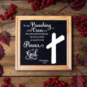 Puede incluir: Una pizarra enmarcada con una cruz blanca y el texto "For the Preaching of the Cross is to them that perish foolishness; but unto us which are saved it is the Power of God. I Corinthians 1:18".