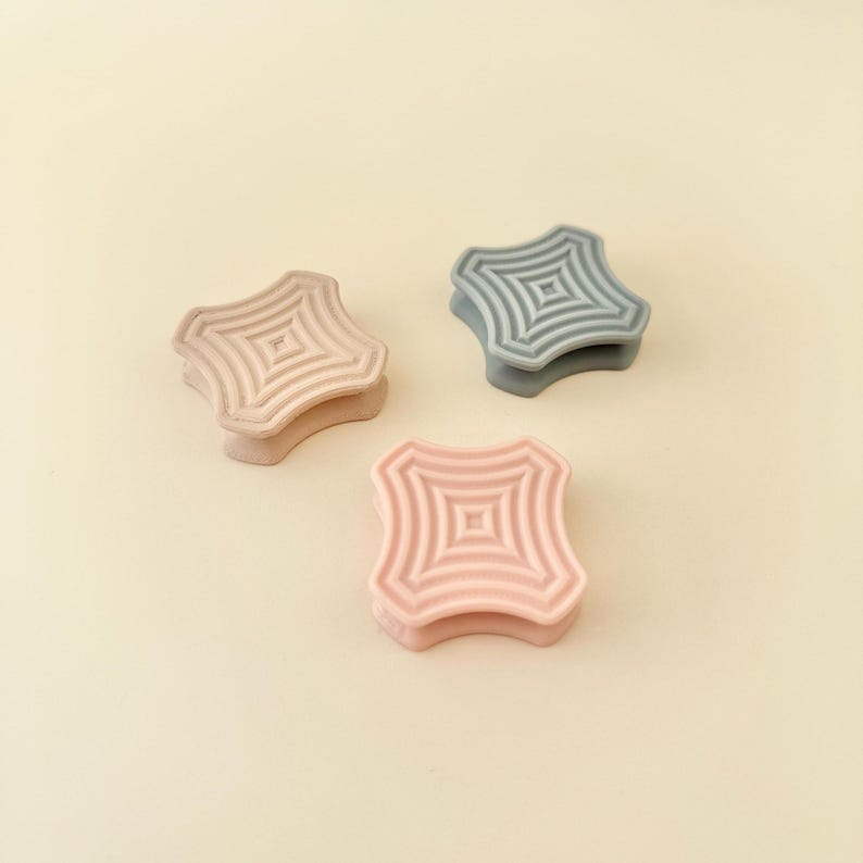 Sliding magnetic pieces that click together for tactile play