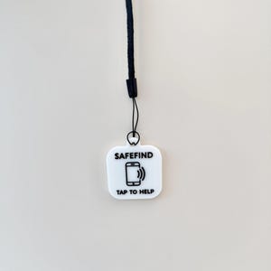 NFC tag keyring with sleek design and memory aid features, ideal for safety and independence.