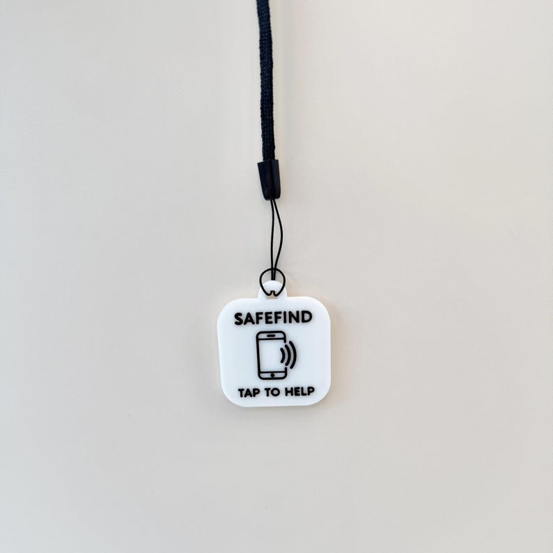 NFC tag keyring with sleek design and memory aid features, ideal for safety and independence.
