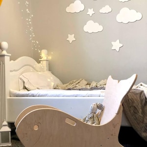 Handcrafted Wooden Rocking Toy for Toddlers: A Whimsical Addition to Any Nursery