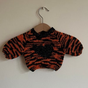 Hand knitted jumper for a doll or bear Halloween colours