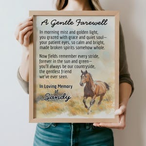 May include: A framed print featuring the text "A Gentle Farewell" and a watercolour painting of a brown horse running in a field. The print is in loving memory of Sandy.