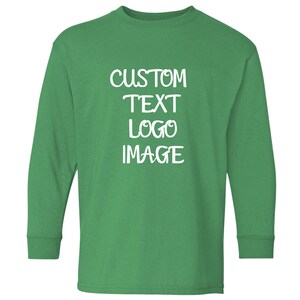May include: A long-sleeved, green shirt with the words "CUSTOM TEXT LOGO IMAGE" in white script. The shirt is a solid color and has a crew neck. The text is vertically aligned.