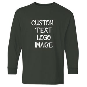May include: Dark green long-sleeve shirt with the words "CUSTOM TEXT LOGO IMAGE" in white block letters. The shirt has a crew neck and is made of a soft material. This shirt is perfect for custom designs.