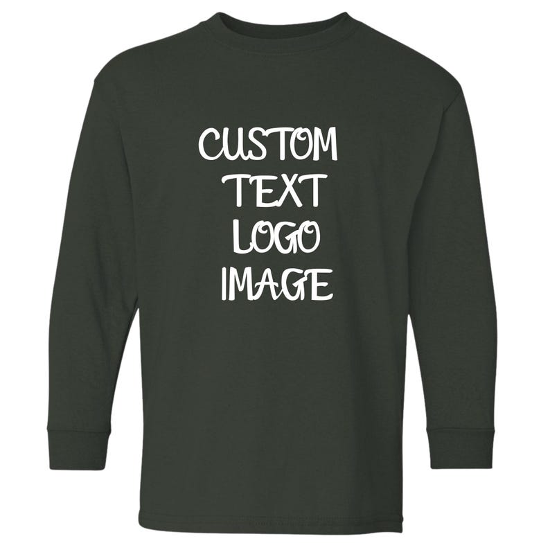 May include: Dark green long-sleeve shirt with the words "CUSTOM TEXT LOGO IMAGE" in white block letters. The shirt has a crew neck and is made of a soft material. This shirt is perfect for custom designs.