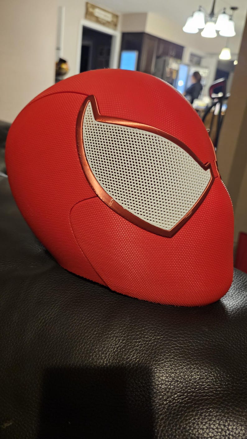 May include: A white ceramic mug with a black handle and the text "But First, Coffee" in a black, handwritten-style font. The mug is on a white surface.