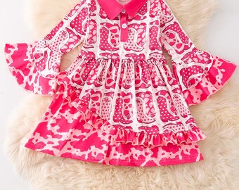 Cowgirl boot fuchsia printed dress with cow printed hem. DRG54117