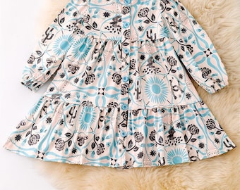 Aqua floral printed girl tiered dress. DRG54120