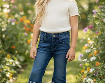 Dark denim blue boot stitch bleached pants. PNG60139