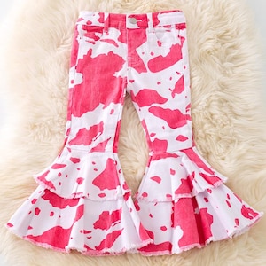 Pinke Pumphose mit Kuhflecken und verstellbarem Bund.