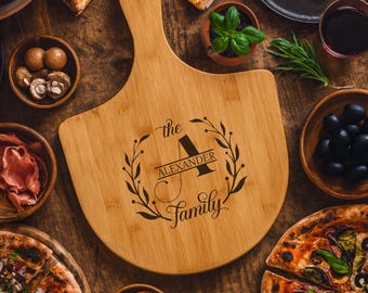 Pala de pizza de bambú personalizada, tabla de cortar con nombre de familia grabado