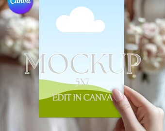 May include: A white card with a blue sky and green grass background. The card has a white cloud and the text "MOCKUP 5x7 EDIT IN CANVA".