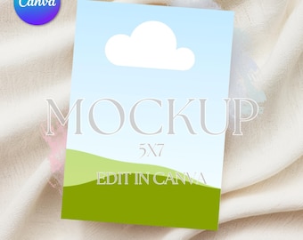May include: A mockup of a 5x7 inch card with a blue sky, white cloud, and green grass. The text "MOCKUP" and "EDIT IN CANVA" are on the card.