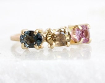 3 stone spinel ring in 14k Yellow Gold