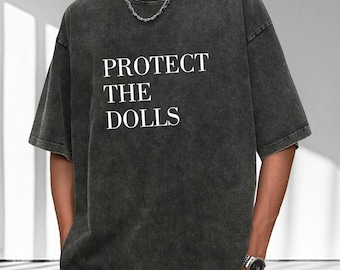 Protect The Dolls,Save Our Toys,Doll Lovers Unite,Eco Friendly Fashion,Sustainable Style,Playful Activism,Doll Advocacy,Toy Conservation