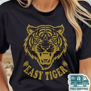 Easy Tiger Shirt, Retro Boho Aesthetic Tee, Unisex Oversized Graphic Tee, Trendy Hippie Clothes & Gifts, Vintage Indie Shirt, Bella+Canvas® 3001 T-Shirt, Gildan Sweatshirt & Hoodie, funny tripping shirt, vintage tee designs, aesthetic trendy top, easy tiger gifts, fun gifts for sister, shirts that go hard, comfy indie fashion, feminist sassy shirt, festival clothing, plus sizing bff gift, retro boho aesthetic
