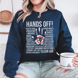 Hands Off Shirt, Hands Off Rally, Hands Off Protest Shirt, Political Activism Shirt, Resist Shirt, Hands Off Social Security Tee, Protest, Bella+Canvas 3001 T-Shirt, Gildan Sweatshirt & Hoodie, social security, hands off shirt, medicare shirt, anti trump shirt, political activism, resist shirt, anti elon musk tee, hands off medicaid, hands off political, hands off protest, hands off rally, hands of our jobs, protest shirt