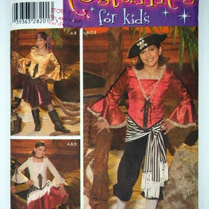 May include: Simplicity costume pattern for children, showcasing a pirate outfit with a red top, black trousers, and a pirate hat. The pattern includes sizes 7, 8, 10, 12, and 14. Other costume variations are also shown on the package.