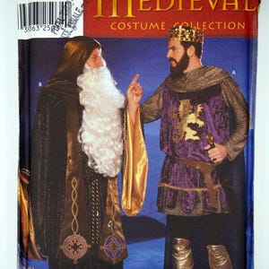 May include: A Simplicity pattern for a medieval costume. The pattern includes two costumes: a wizard with a long beard and a king with a crown. The pattern is for sizes BB, L, and XL.