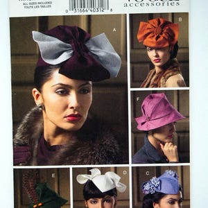 May include: Vogue accessories pattern V8175 showing six hat designs. The hats are in various colours, including burgundy, orange, purple, white, green, and blue. The pattern includes all sizes and is suitable for making hats.
