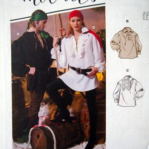 May include: McCall's sewing pattern for a pirate costume. The pattern includes instructions for a white shirt with a ruffled collar and a black shirt with a lace-up front. The pattern also includes instructions for a pirate hat.