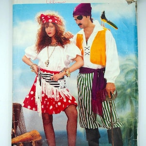 May include: A vintage Butterick sewing pattern envelope featuring two people in pirate costumes. The woman wears a red polka dot skirt, and the man wears striped pants and an eye patch. The pattern is labeled "6731".