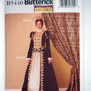 May include: A Butterick B5440 sewing pattern envelope featuring a historical-style gown with a dark bodice, gold trim, red accents, and a light-colored skirt. The package includes the text B5440, Butterick, Making History, and size range AA 6-8-10-12.