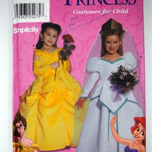 May include: A Simplicity pattern for Disney Princess costumes for children. The pink package features illustrations of two girls in princess dresses, including Belle and a bride. The text reads "Disney Princess Costumes for Child."