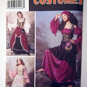 Può includere: Modello di cucito Simplicity Costumes con modelli di costumi in stile medievale. Il modello include opzioni per abiti con bustini, maniche lunghe e accessori. La tavolozza dei colori comprende rosso, nero, rosa e oro.
