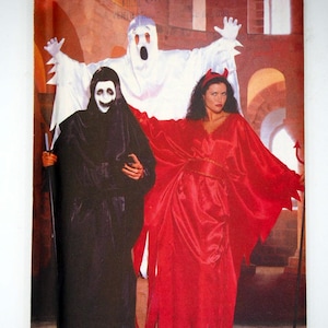 May include: A vintage Butterick pattern featuring three Halloween costumes: a ghost, a devil, and a grim reaper. The costumes are in red, black, and white. The pattern number is 6296.