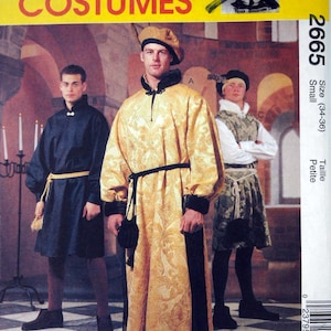 Pode incluir: Padrão de costura McCall's Costumes com trajes medievais. O padrão inclui designs para uma longa túnica dourada com acabamento preto, uma túnica azul escura e um colete estampado com saia. Tamanho pequeno (34-36).