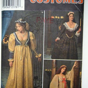 Peut inclure: Patron de couture Simplicity Costumes pour deux robes médiévales. Le patron comprend des instructions pour une robe à manches longues avec un corsage ajusté et une jupe ample, et une robe à manches longues avec un corsage ample et une jupe fluide. Le patron est pour les tailles 10, 12 et 14.