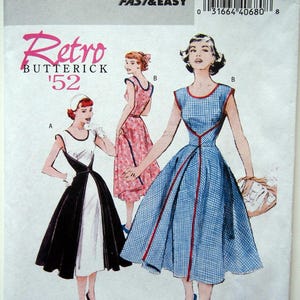 Pode incluir: Um padrão de costura vintage para três vestidos. O padrão é da Butterick e se chama "Retro '52". O padrão inclui instruções para fazer um vestido preto e branco, um vestido estampado floral e um vestido xadrez azul.