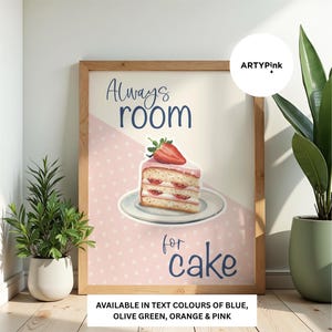 May include: A framed print with the words "Always room for cake" and a watercolor illustration of a cake slice topped with a strawberry. The background is a light pink with white polka dots. The text is in blue.