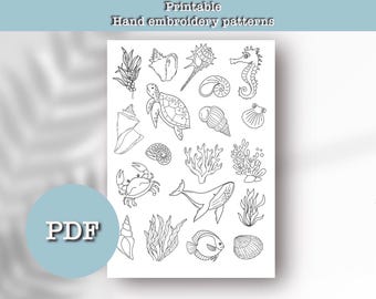 May include: Printable hand embroidery patterns featuring a variety of sea life, including a seahorse, turtle, crab, whale, and seashells. The patterns are black and white and perfect for embroidery projects.