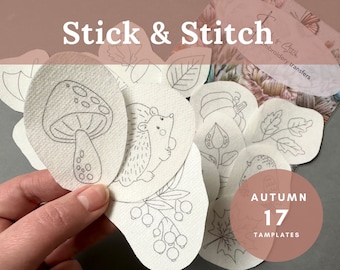 May include: A set of 17 autumn-themed embroidery transfer templates featuring designs like a mushroom, hedgehog, leaves, and berries. The templates are printed on white fabric and are ready to be used for embroidery projects.