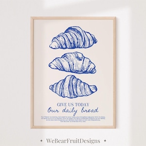 Könnte beinhalten: Ein blauer und weißer druckbarer Kunstdruck mit einem Zitat über das tägliche Brot und drei blauen Illustrationen von Croissants. Das Zitat lautet "Gib uns heute unser tägliches Brot".
