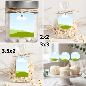K&ouml;nnte beinhalten: Ein Set aus Party-Anh&auml;ngern mit einem Design aus blauem Himmel, wei&szlig;er Wolke und gr&uuml;nen H&uuml;geln. Das Set enth&auml;lt quadratische, runde und rechteckige Anh&auml;nger an Gl&auml;sern, durchsichtigen Popcorn-T&uuml;ten und als Dekoration f&uuml;r Cupcakes.